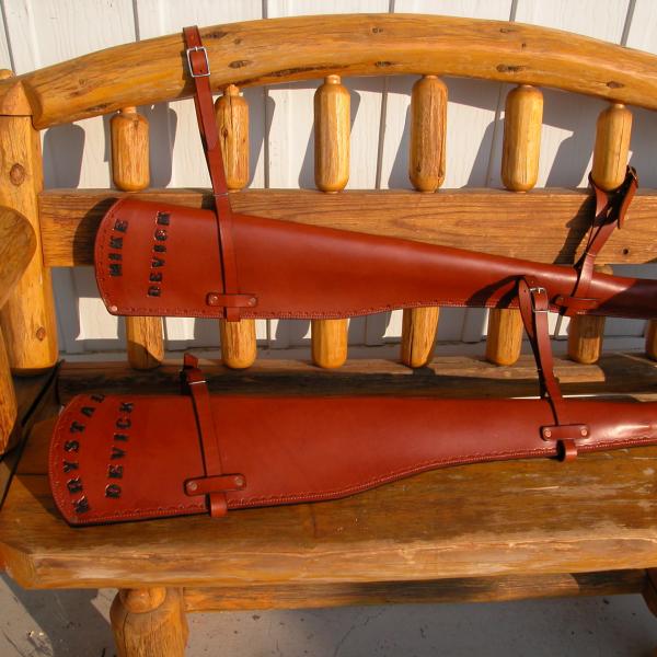 Rifle Scabbards Assorted And Some With Mounting Straps To Attach to What Ever You Ride. Horse Or Horse Powered Vehicle With Wheels. Custom, Full Grain Leather, Hand tooled, Hand made in the Okanagan, Oliver, B.C., Canada.